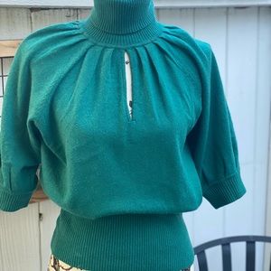 Cathrine Malardrino green turtleneck short sleeve sweater with lots of details